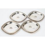 A set of four French silver plated dishes by Christofle, each of shaped square form,