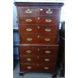 A George III mahogany chest on chest with two short over six long graduated drawers divided by