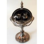A silver plated on copper ink stand, of sprung spherical form,