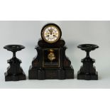A French black slate clock garniture, the clock with a 4.5in.