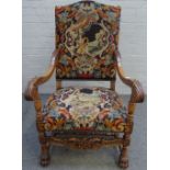 A Louis XIV style beech framed high back open armchair, on paw feet, 66cm wide x 118cm high.