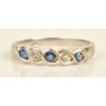 A white gold, sapphire and diamond set five stone ring,