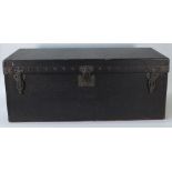 An early 20th century Louis Vuitton black leather motoring trunk, with sloping back,
