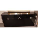 Willy Rizzo; a credenza cabinet, signed 1972, by Mario Sabot, ebonised with chrome handles,