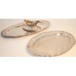 A group of plated wares, comprising; two shaped oval serving dishes, length 65cm and 49.