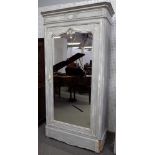 A French 19th century grey painted single mirrored door wardrobe with hidden drawer base,