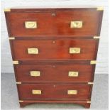 A campaign style brass bound mahogany two part chest of four long drawers, on bracket feet,