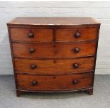 An early Victorian fruitwood banded mahogany bowfront chest of two short and three long graduated