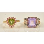 An 18ct gold, peridot and pink sapphire set heart shaped cluster ring,