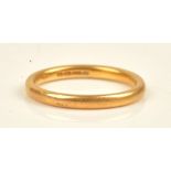A 22ct gold plain wedding ring, London 1941, ring size Q, weight 4.6 gms.