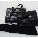 A Donna Karen New York black leather crocodile effect twin handled work bag,