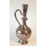 A Russian wine ewer of bulbous form, with a curved handle raised on a circular foot,