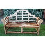 A Lutyens design teak framed garden bench, 165cm wide x 104cm high.