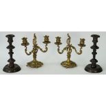 A pair of gilt metal twin branch candelabra, in the rococo taste, 24cm high,