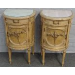 A pair of Louis XVI style carved beech and cane work demi-lune bedside tables,