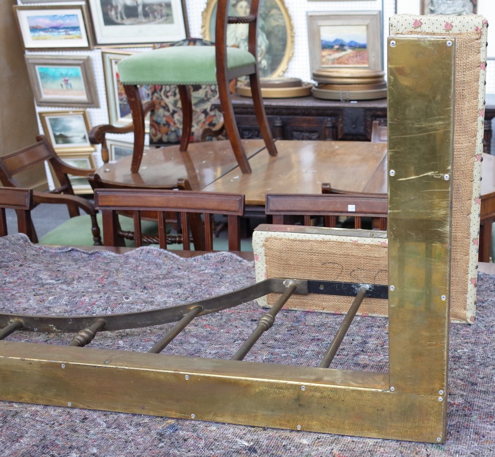 An early 20th century brass and cream upholstered club fender with sloped curb, - Image 6 of 11