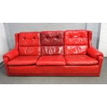Gimson Slater Collection, a rouge leather upholstered three seat sofa, 213cm wide x 88cm high,