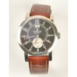 A Corum Automatic steel circular cased gentleman's wristwatch,