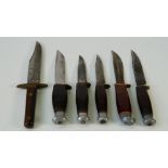 Six early 20th century steel bladed hunting knives, to include an example by H.