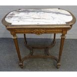 A late 19th century French centre table, the marble inset top, on four fluted gilt supports,