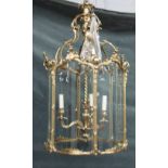 A gilt brass hexagonal hall lantern, in the Louis XV style, 20th century,