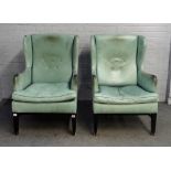 A pair of aqua green leather upholstered mid-20th century wingback easy armchairs,
