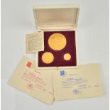 A set of three 18ct gold proof medallions commemorating Sir Winston Churchill, combined weight 70.