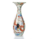 A tall Japanese Imari vase, Meiji period, slender baluster form with frilled rim,