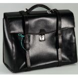 A Dunhill leather travel holdall bag, 48cm wide, and a Dunhill briefcase, 45cm wide, (2).