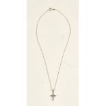 A white gold and diamond set pendant cross, mounted with five circular cut diamonds,