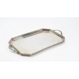 A plated on copper shaped rectangular twin handled tray,