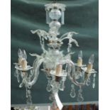 A 20th century Italian style glass six light chandelier with spiral column and moulded branches