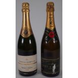 One bottle of 1986 Moet and Chandon Champagne and a bottle of 1990 Duval-Leroy Champagne (2).