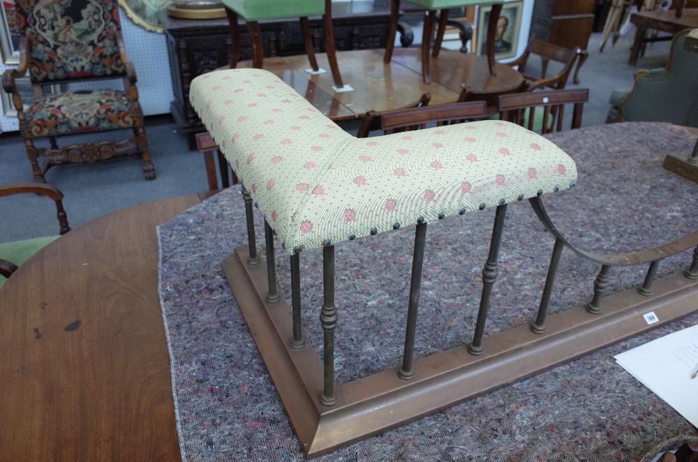 An early 20th century brass and cream upholstered club fender with sloped curb, - Image 9 of 11