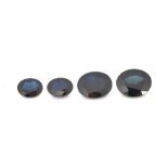 Four unmounted oval cut loose sapphires, (4).