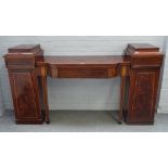 A George III inlaid mahogany sideboard, with central bow single drawer, flanked by pedestals,