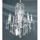 A modern silver painted metal and glass eight-light chandelier, 74cm drop x 61cm wide.