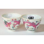 A pair of Chinese famille-rose wine cups, iron-red Qianlong seal marks but later,