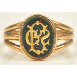 An 18ct gold and bloodstone set oval signet ring,