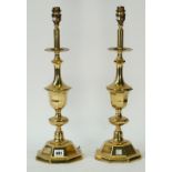 A pair of modern brass table lamps, of knopped baluster form on octagonal bases, with shades,