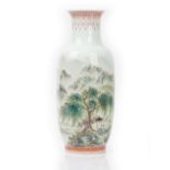 A tall Chinese porcelain rouleau vase, painted with a mountainous landscape,
