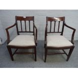A pair of George III mahogany carver chairs, with bow seat, on tapering square supports,