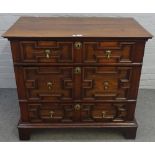 A Charles II oak chest of three long graduated geometric moulded drawers on bracket feet,