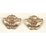 A Georg Jensen pair of silver and carbuncle garnet set brooches,