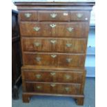 A George II figured walnut chest on chest with three short over five long graduated drawers on