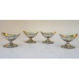A set of four George III silver salts, each of boat shaped form, gilt within,