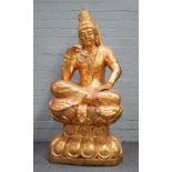 A large modern giltwood model of a Buddha on a lotus base, 122cm high.