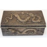 A Chinese rectangular table cigarette box, wooden lined within, the exterior decorated with dragons,