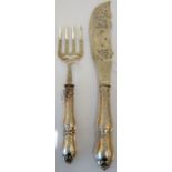 A pair of Victorian silver fish servers,