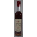 One bottle of 1954 Nismes-delclou armagnac.